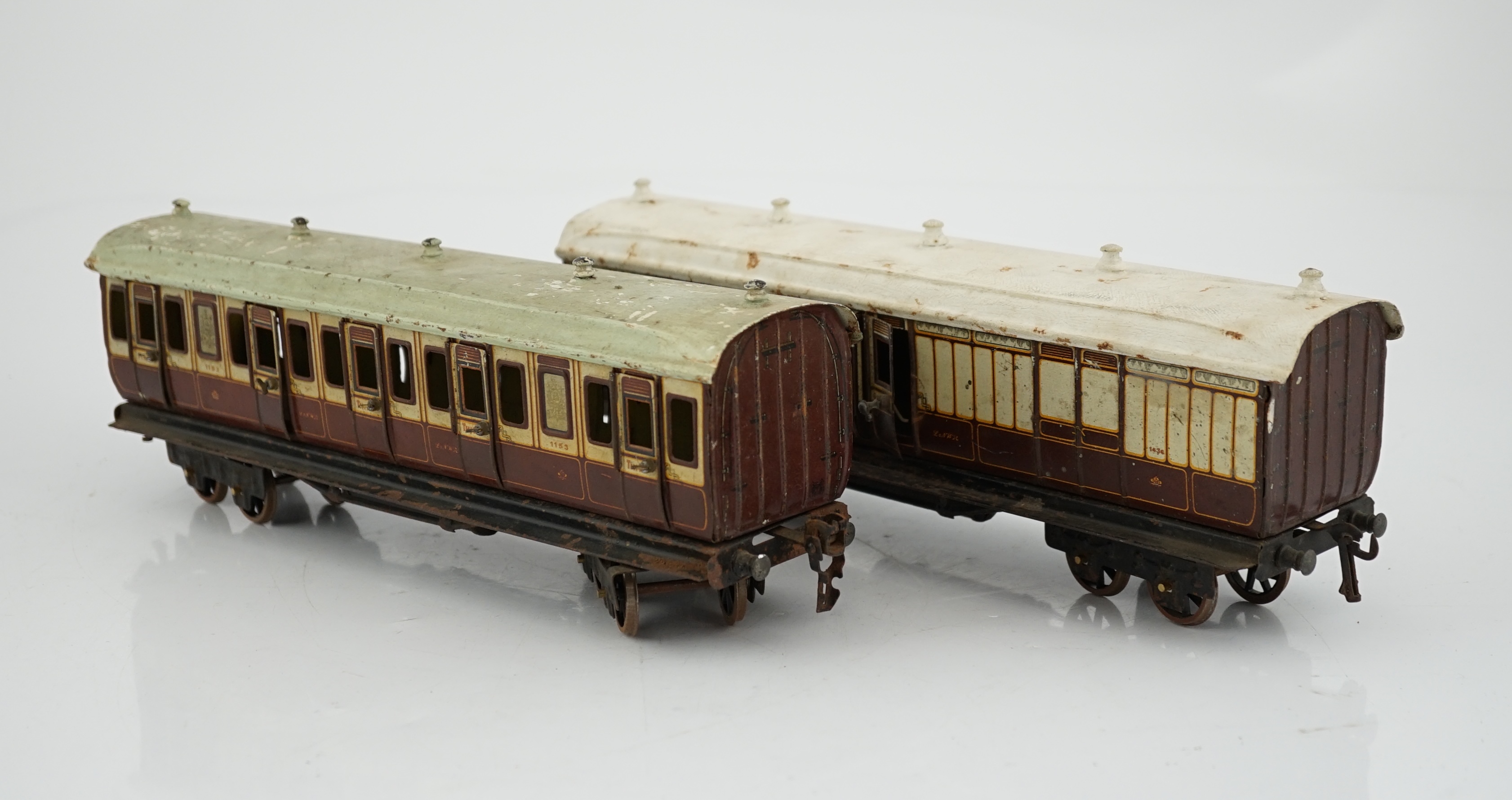 Two Marklin 0 gauge tinplate LNWR coaches; a First Third composite and a Full Guard’s van